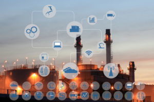 68384387_s 68384387 - industry 4.0 concept image.oil refinery at twilight with cyber and physical system icons diagram on industrial factory and infrastructure background.